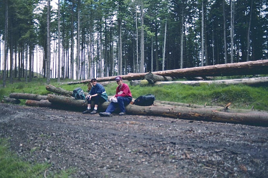 Elizabeth and Gavan have a rest on a forestry road above Glendalough