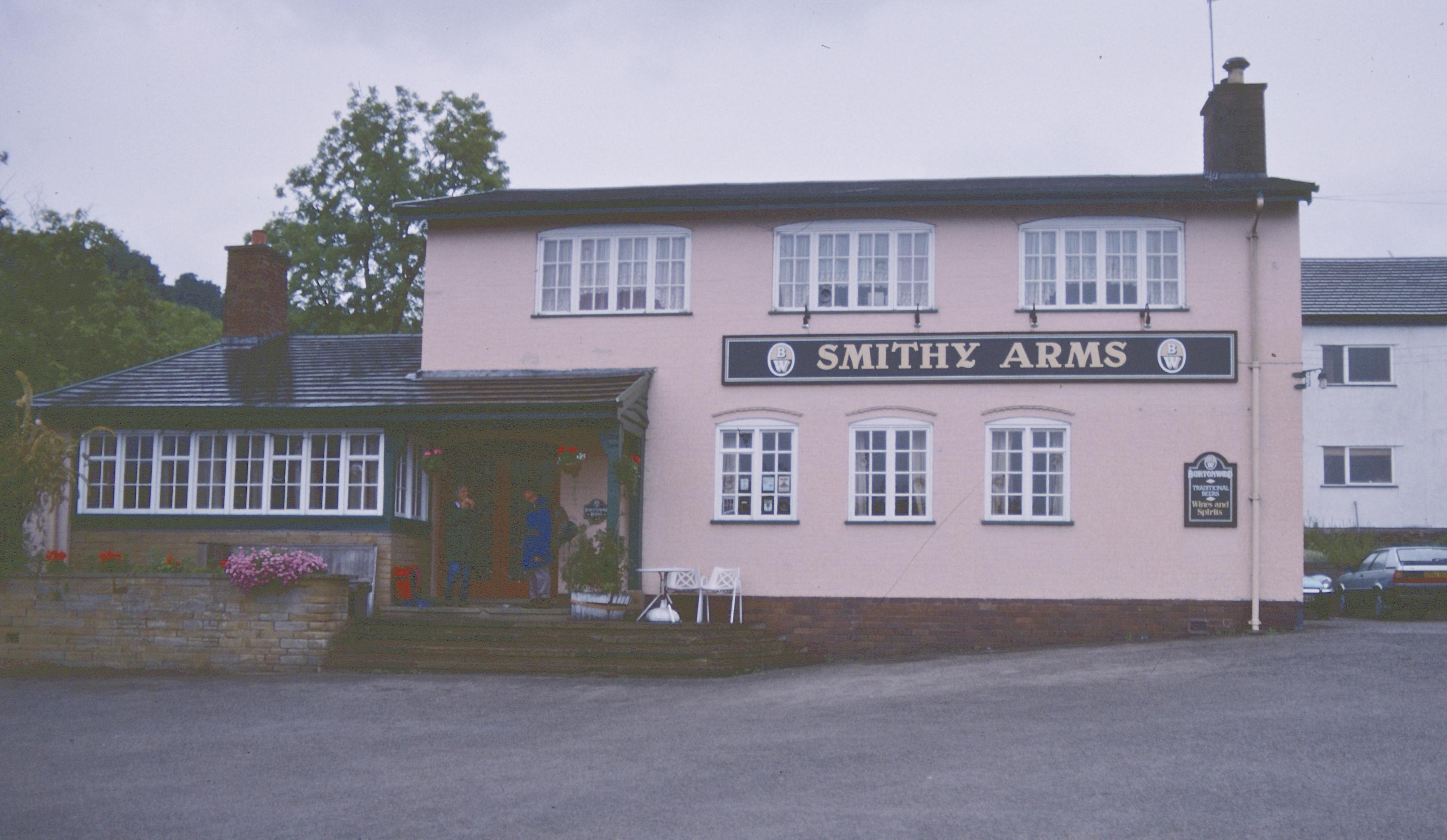 The Lees sheltering from the rain at the Smithy Arms, Rhuallt