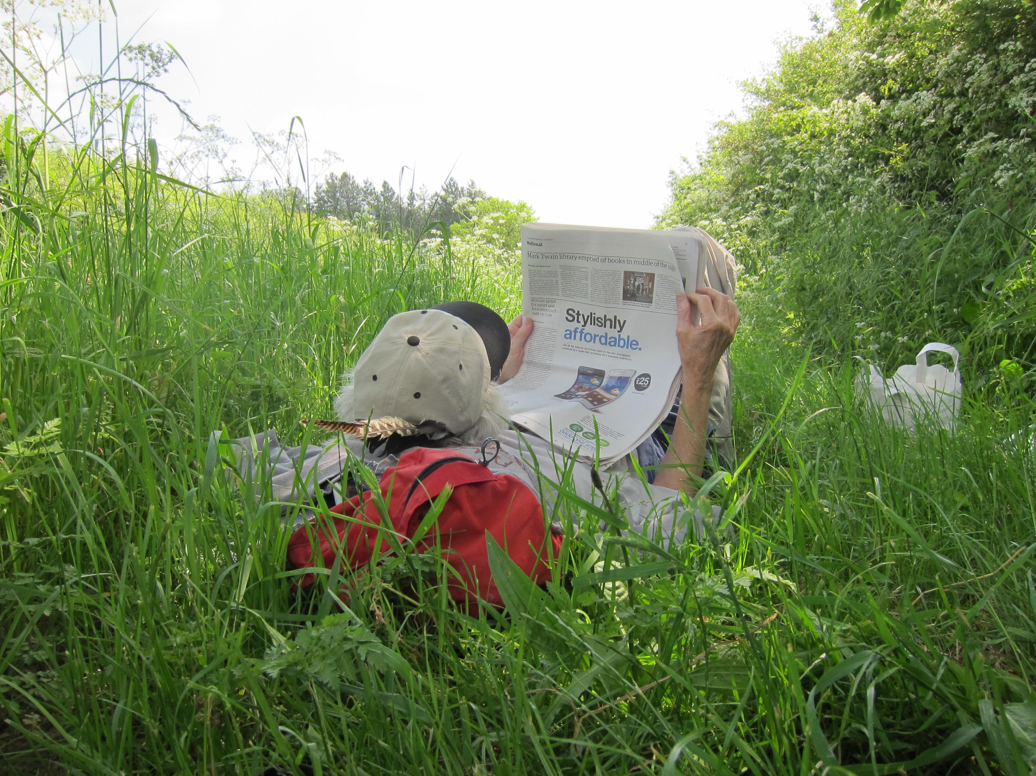 Tosh relaxes at lunch.