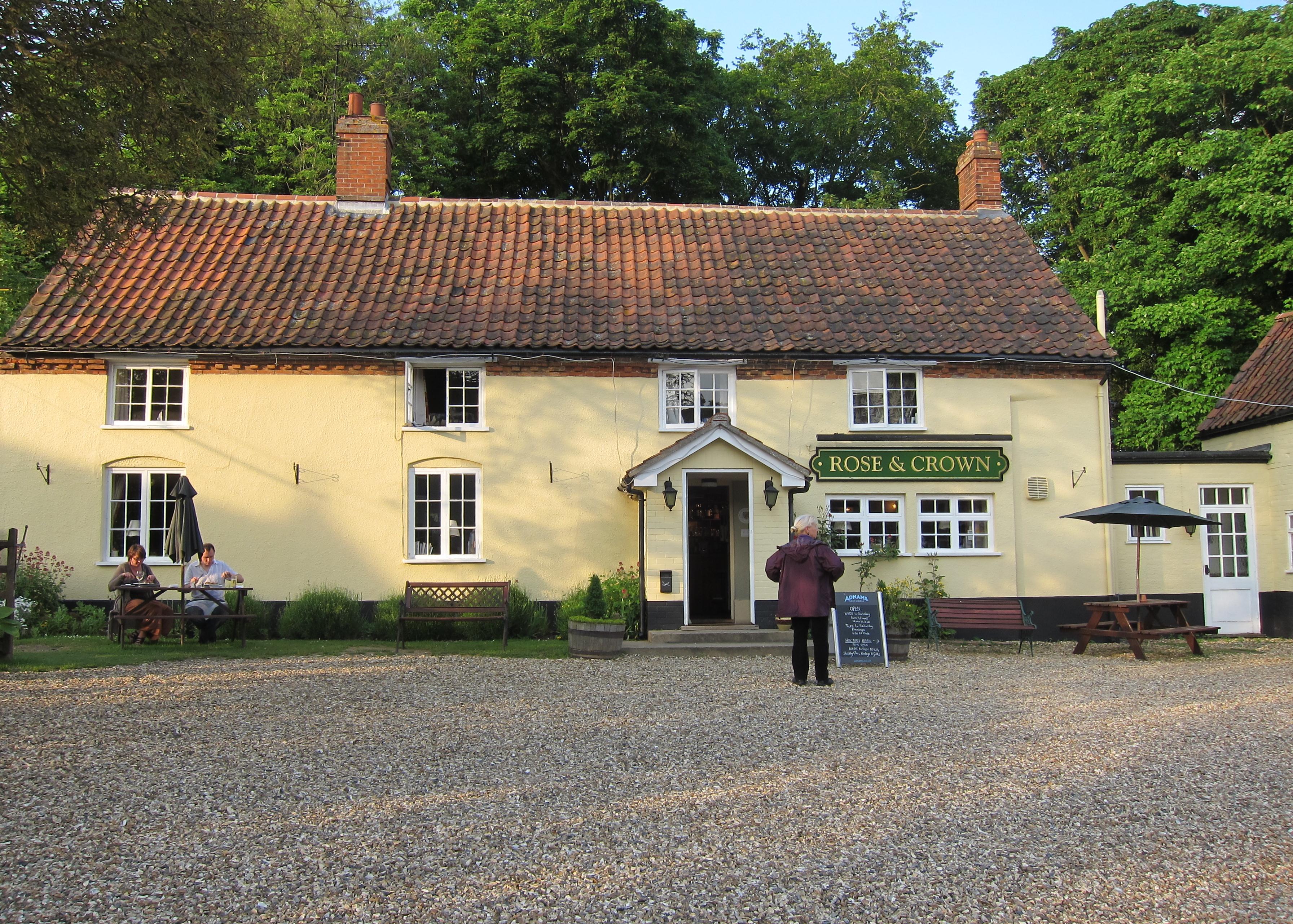 Marge approaches the Rose & Crown, Harpley.